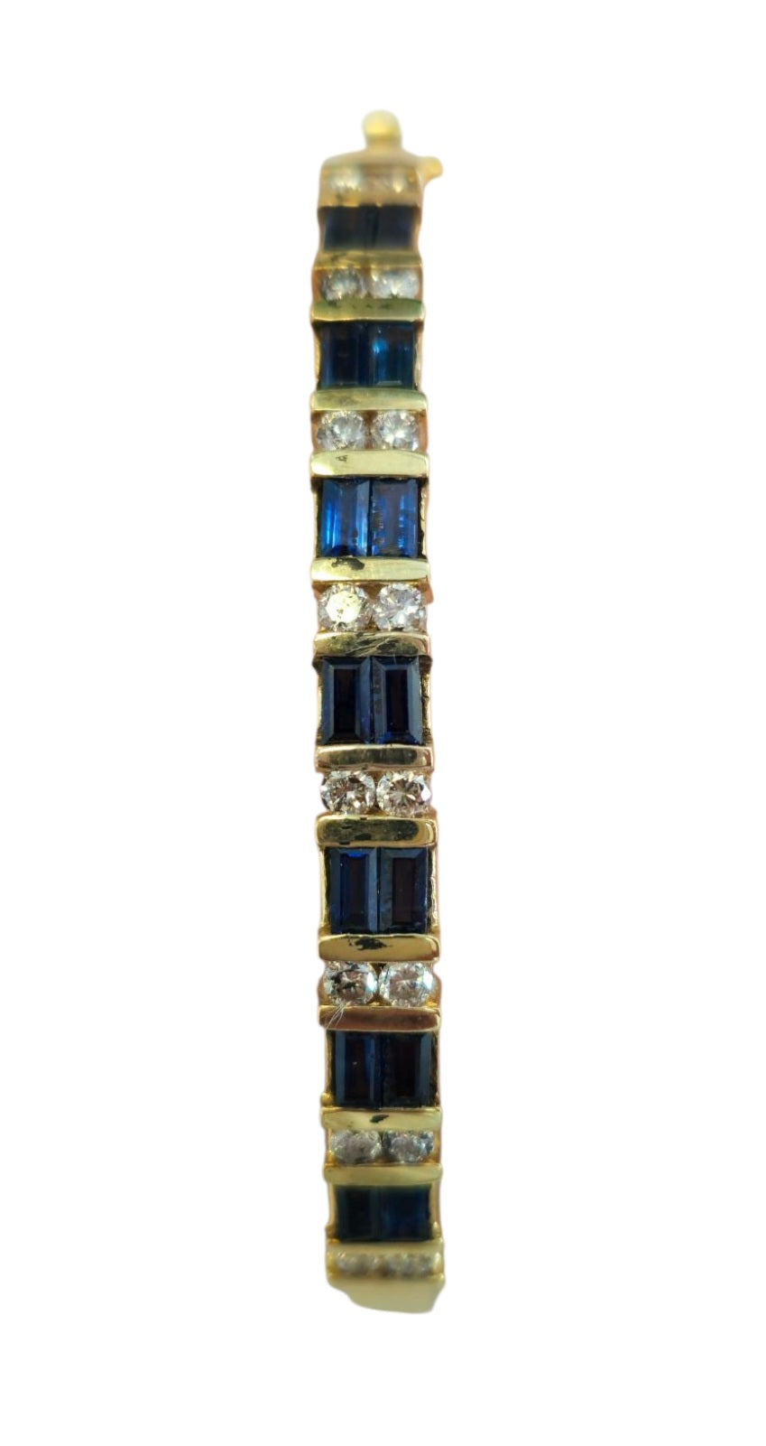Circa 1980 Sapphire and Diamond Bangle Bracelet in 14 Karat Yellow Gold