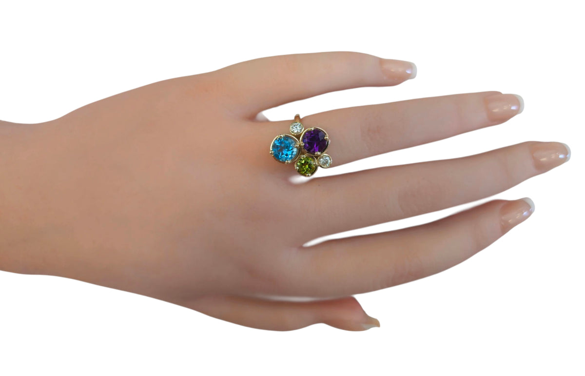 Blue Topaz , Peridot , Amethyst, and Diamond Ring in 14 Karat Yellow Gold