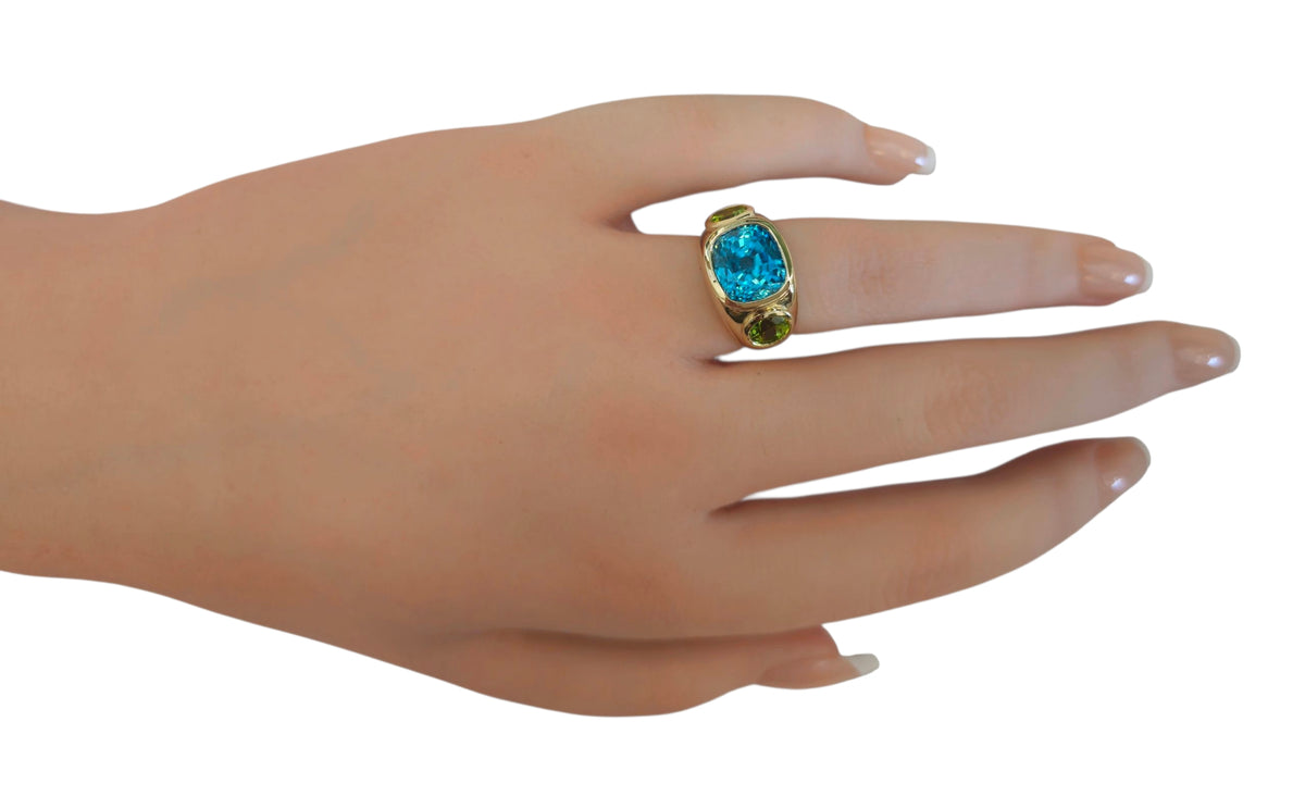 Blue Zircon Cushion Cut and Round Cut Peridot Wide Band Ring in 14 Karat Yellow Gold