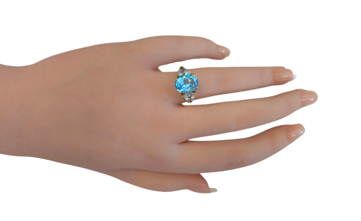 Blue Topaz and White Sapphire Ring in 14 Karat Yellow Gold