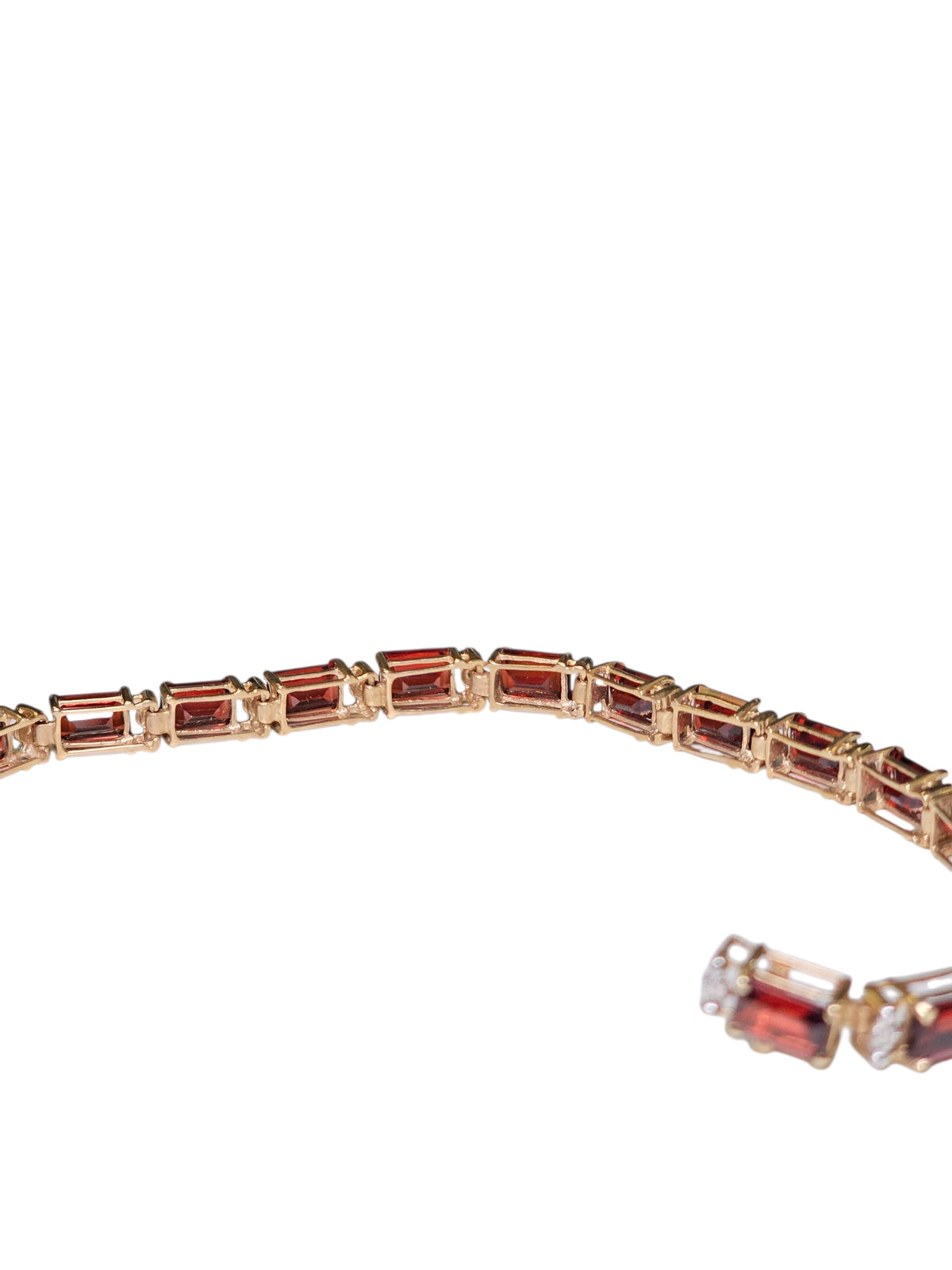 Garnet Tennis Bracelet in 10 Karat Yellow Gold