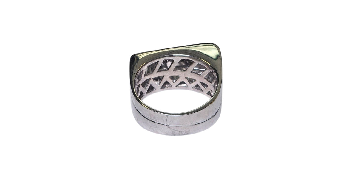 Round and Baguette Diamond Ring in 18 Karat White Gold
