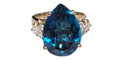 L Blue Topaz Ring in 14 Karat Yellow Gold