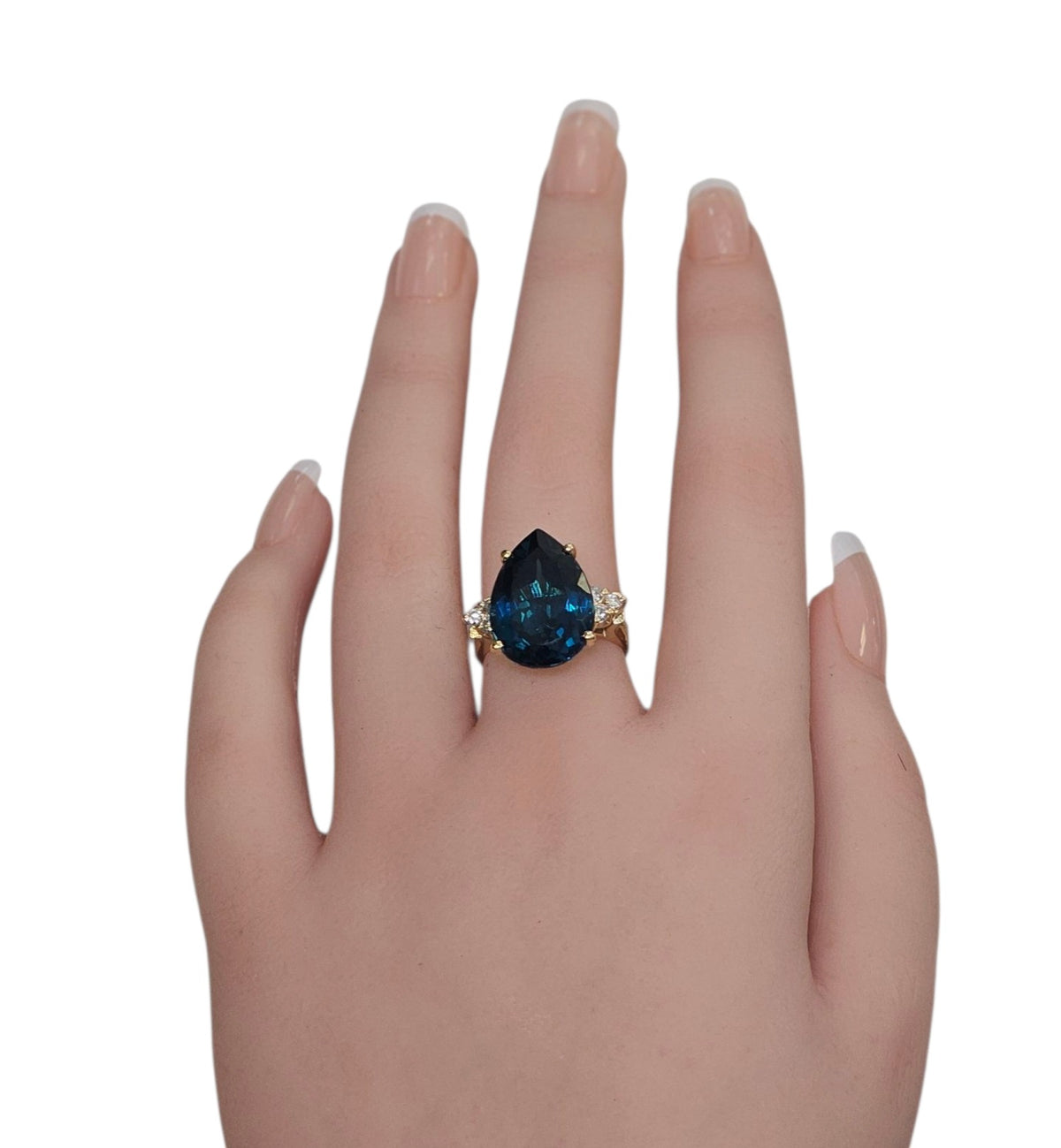 L Blue Topaz Ring in 14 Karat Yellow Gold
