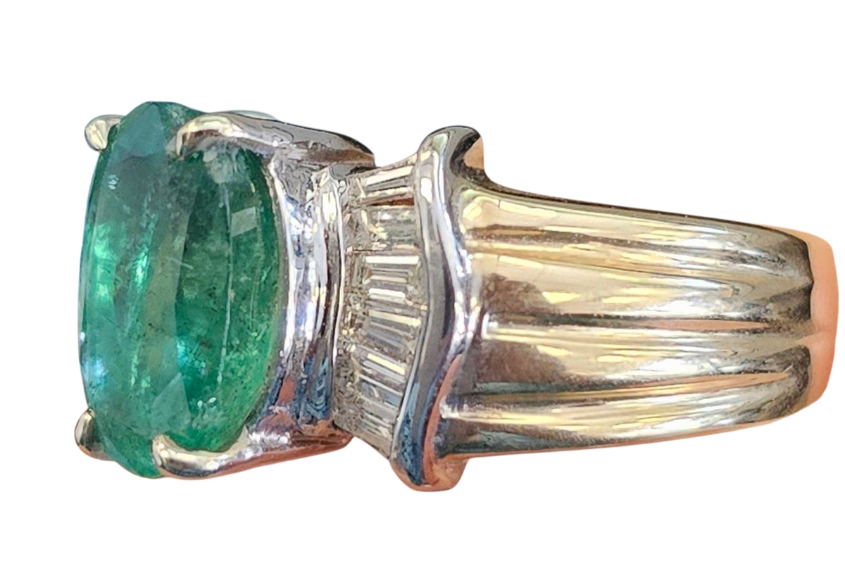 Emerald and Baguette Cut Diamond Ring in 14 Karat Yellow Gold