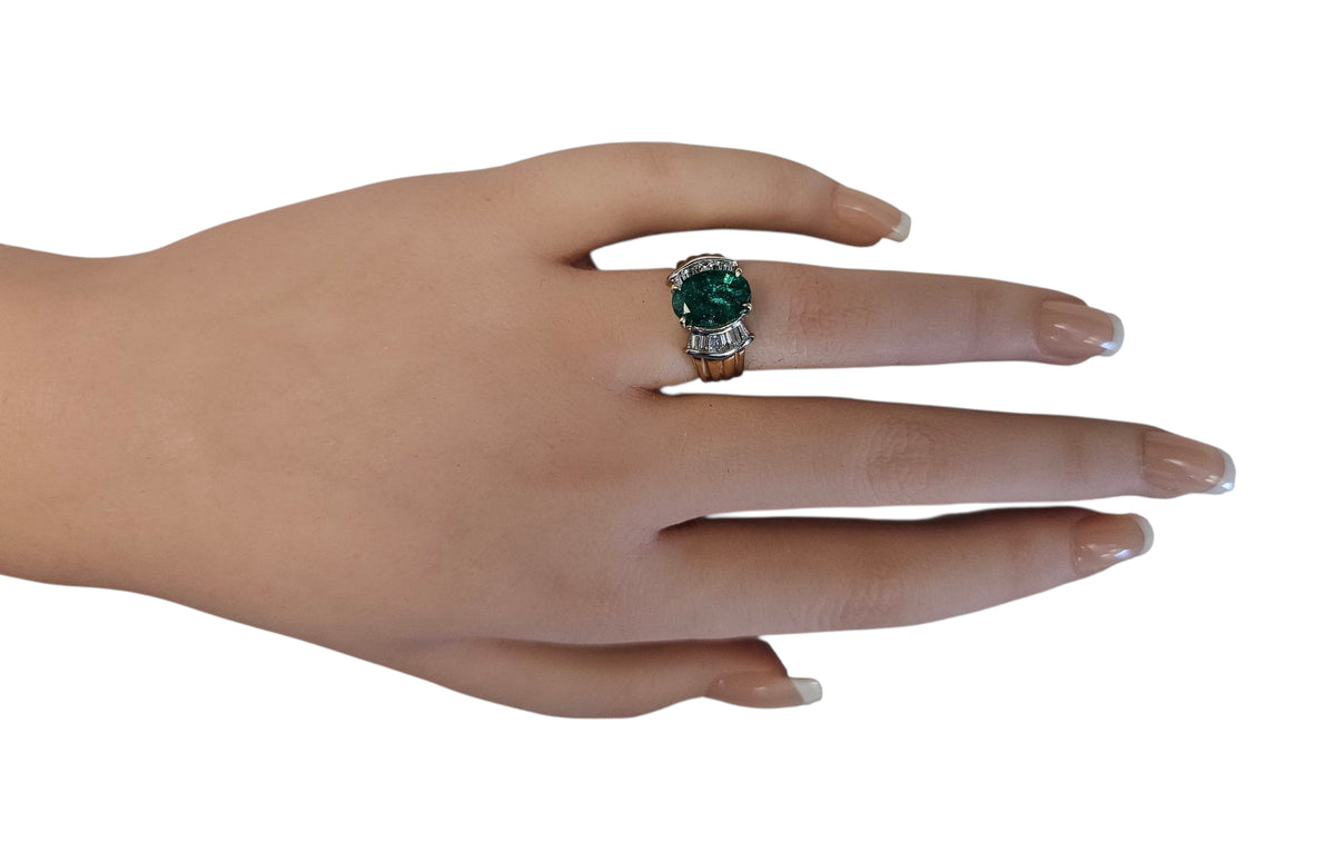 Emerald and Baguette Cut Diamond Ring in 14 Karat Yellow Gold