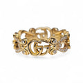 A Ring in 18k yellow gold sparkles with Pave white diamond that alternate with the recognizable Double Gucci Logo