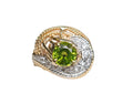 Peridot and Diamond Prong set Twisted Style Design Ring made in 14Karat Two Tone