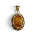 Amber Oval Pendant in 14 Karat Yellow Gold