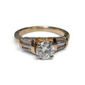 Round Brilliant Cut Diamond with Accent Tapered Baguette Diamonds in 14 Karat Yellow Gold