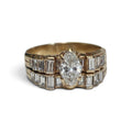 Marquise Diamond with Accent Channel Set Baguette Diamond Engagement Ring in 14 Karat Yellow Gold
