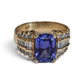 Cushion Cut Tanzanite with Channel Set Baguette and Round Diamond Ring in 14 Karat Yellow Gold