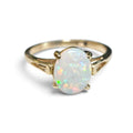 Oval Cabochon Opal Ring in 14 Karat Yellow Gold