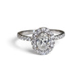 Oval Diamond Halo Engagement Ring in 14 Karat White Gold