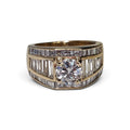 Round Brilliant Cut Center Diamond with Accent Tapered Baguette Diamond Engagement Ring in 14 Karat Yellow Gold