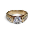 Round Brilliant Cut Diamond with Channel Set Round Diamond Engagment Ring in 14 Karat Yellow Gold