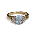 Oval Aquamarine with Accent Diamond Engagement Ring in 14 Karat Yellow Gold