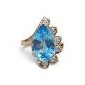 Pear Shape Blue Topaz with Diamonds Ring in 14 Karat Yellow Gold