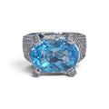 Oval Blue Topaz with Pave Diamonds Cocktail Ring in 14 Karat White Gold
