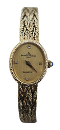 Vintage Baume & Mercier Geneve Quartz Watch with Diamond Dial in 18 Karat Yellow Gold