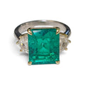 Emerald Cut Lab Grown Emerald and Catillac Cut Land Grow Diamond Ring in 18 Karat Yellow and White Gold