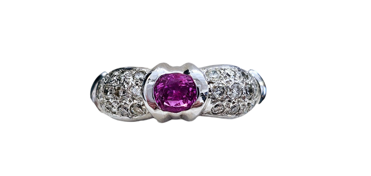 Oval Cut Pink Sapphire Half-Bezel and Pave set Diamond Ring made in 14-Karat White Gold