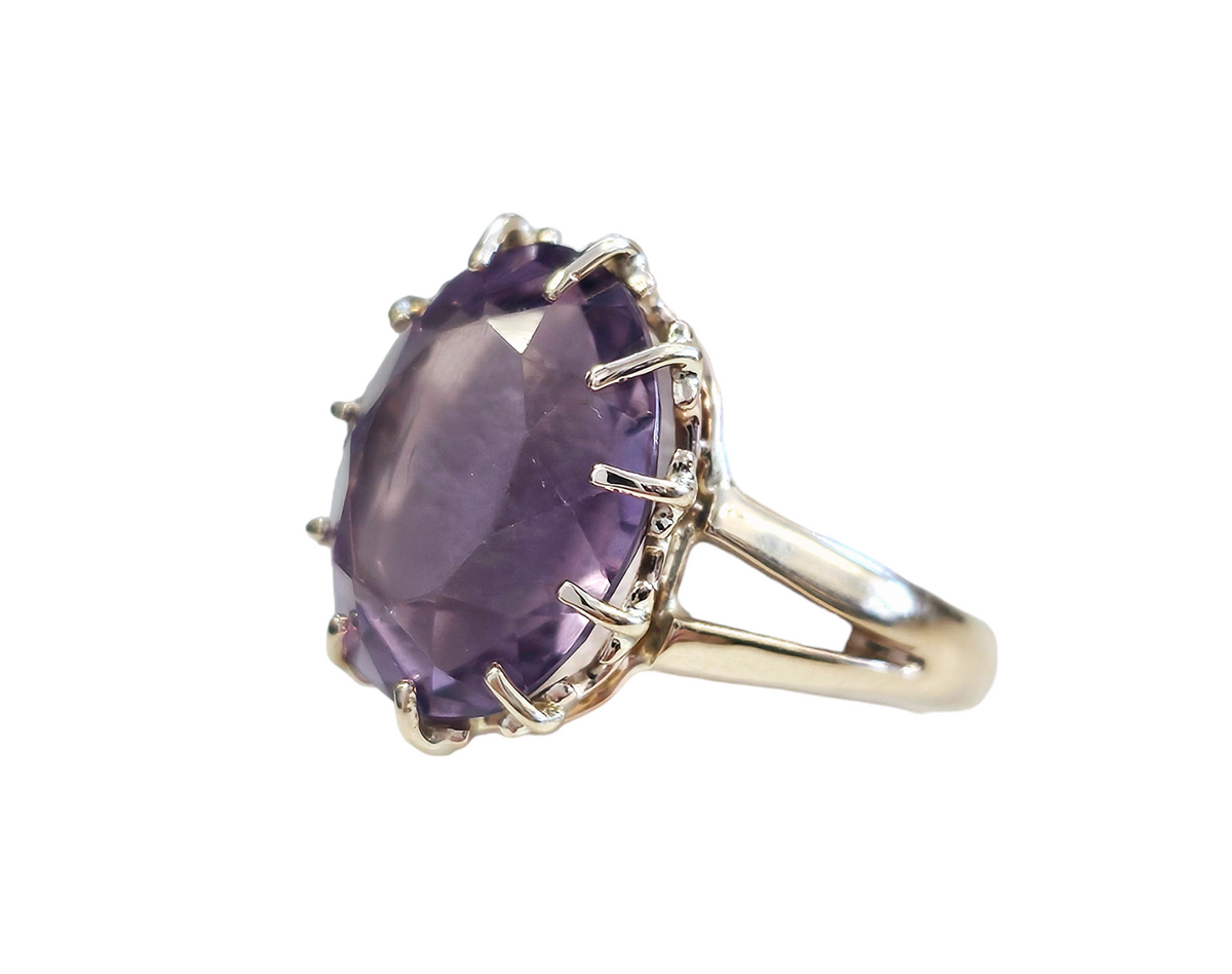 Circa 1960's Vintage Oval Amethyst Ring with Split Shank made in 14-Karat Yellow Gold