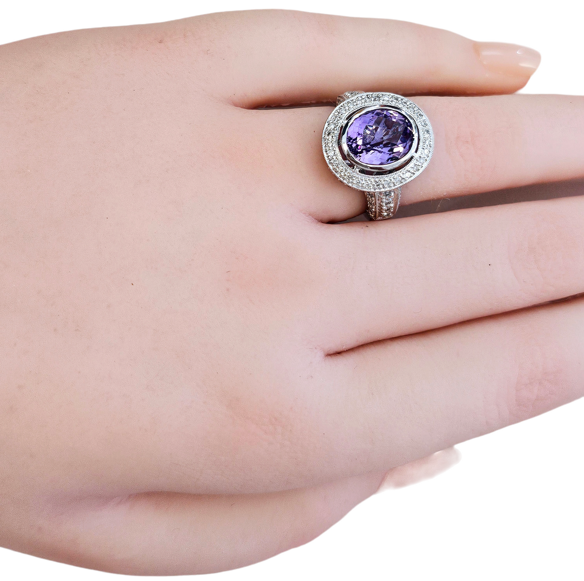 Bezel Set Oval Cut Amethyst and Diamond Halo Ring made in 18-Karat White Gold