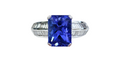 Radiant Cut Tanzanite and Channel Set Baguette Diamond Ring made in 18-Karat White Gold