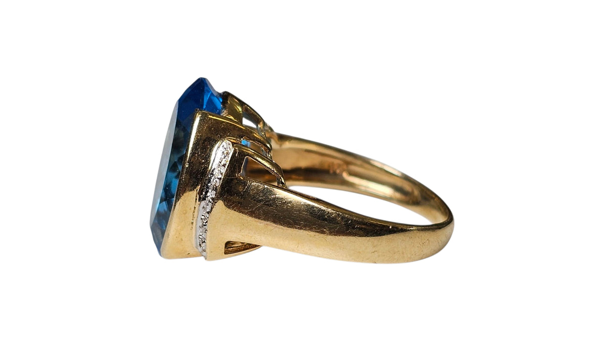 Large Blue Topaz Diamond Ring in 14 Karat Yellow Gold