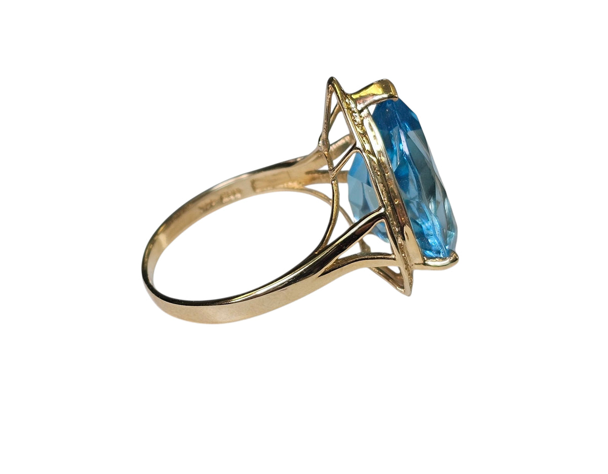 Pear Shape Blue Topaz Ring in 14 Karat Yellow Gold