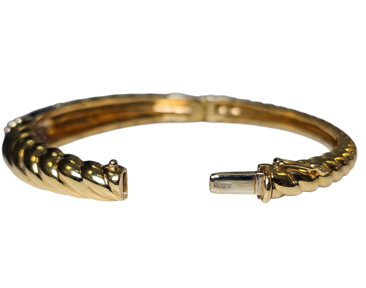 Twisted Style Bangle Bracelet with Diamond Pave made in 18-Karat Yellow Gold.