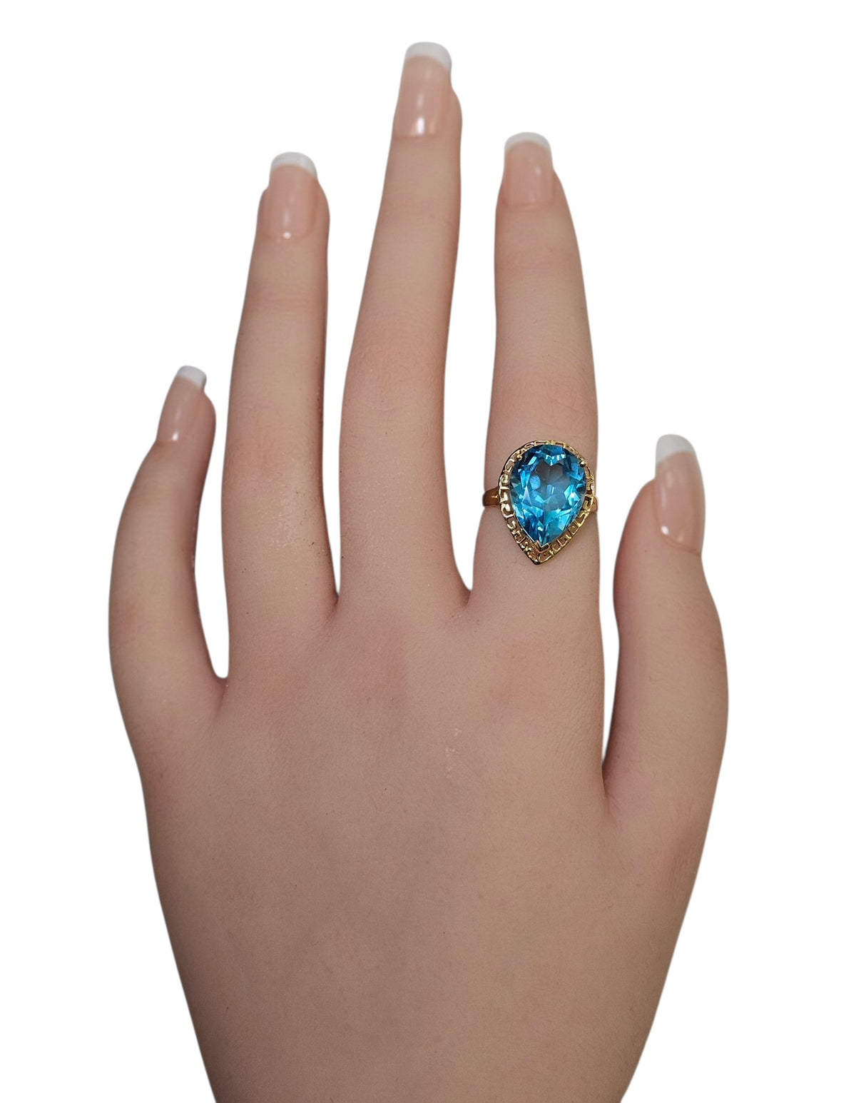 Pear Shape Blue Topaz Ring in 14 Karat Yellow Gold
