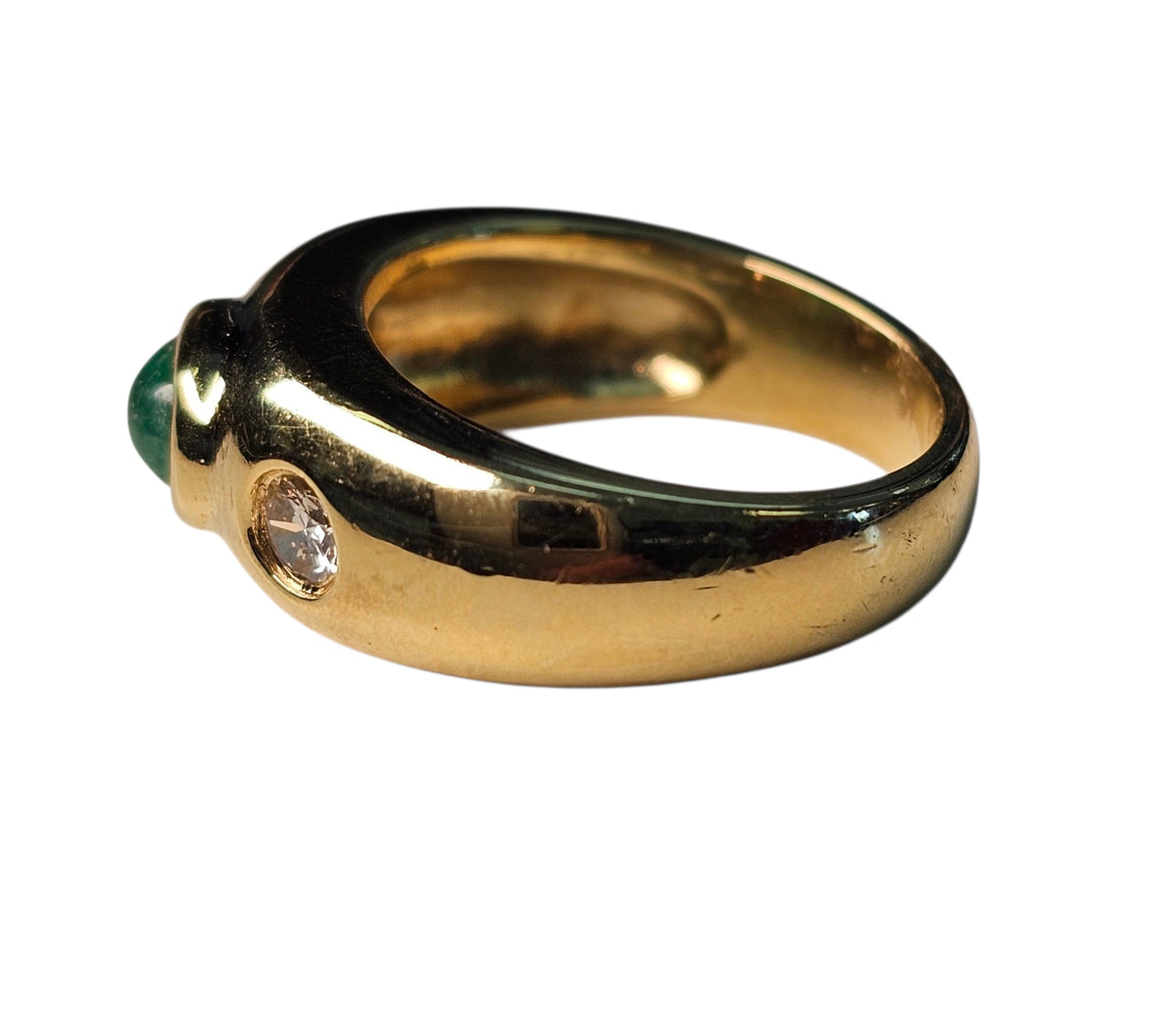 Bezel Set Emerald Ring In 18 Karat Yellow Gold