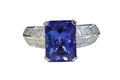 Radiant Cut Tanzanite and Channel Set Baguette Diamond Ring made in 18-Karat W.G