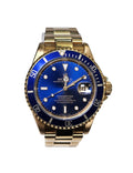 ROLEX SUBMARINER WATCH IN 18 KARAT YELLOW GOLD, BLUE ON BLUE