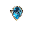 Pear Shape Blue Topaz Ring in 14 Karat Yellow Gold