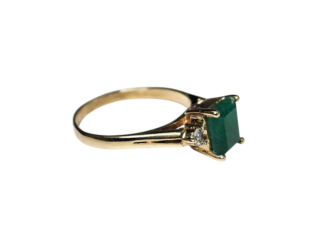 Diamond and Emerald Cut Ring in 14 karat Yellow Gold