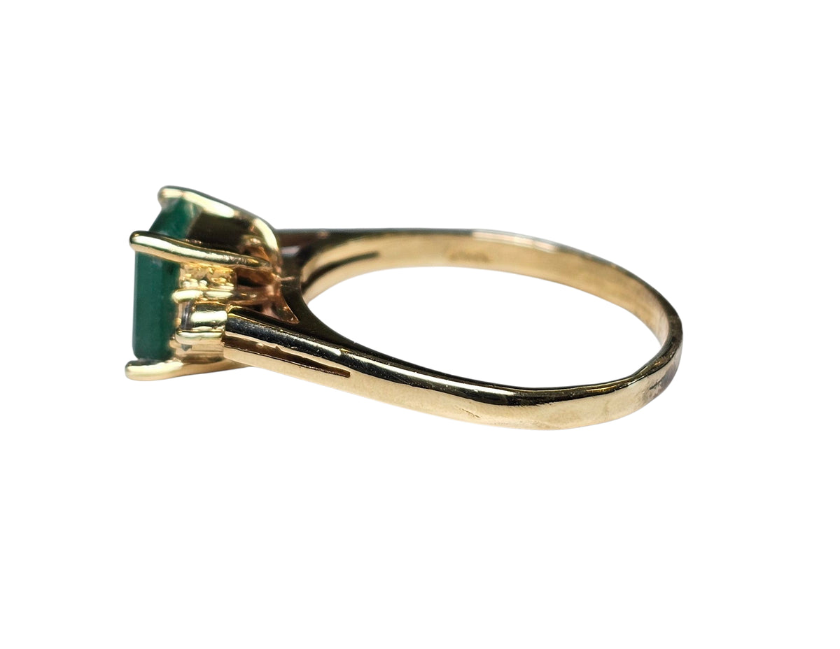 Diamond and Emerald Cut Ring in 14 karat Yellow Gold