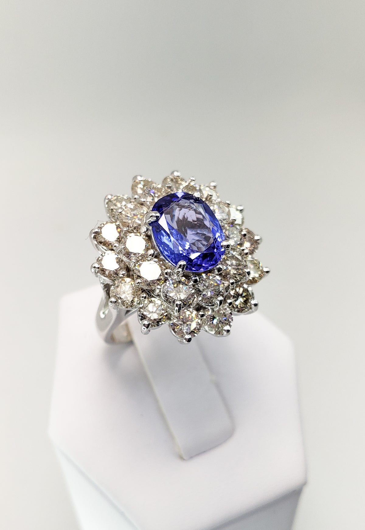 Blue Tanzanite and Diamond Halo 18K White Gold Ring