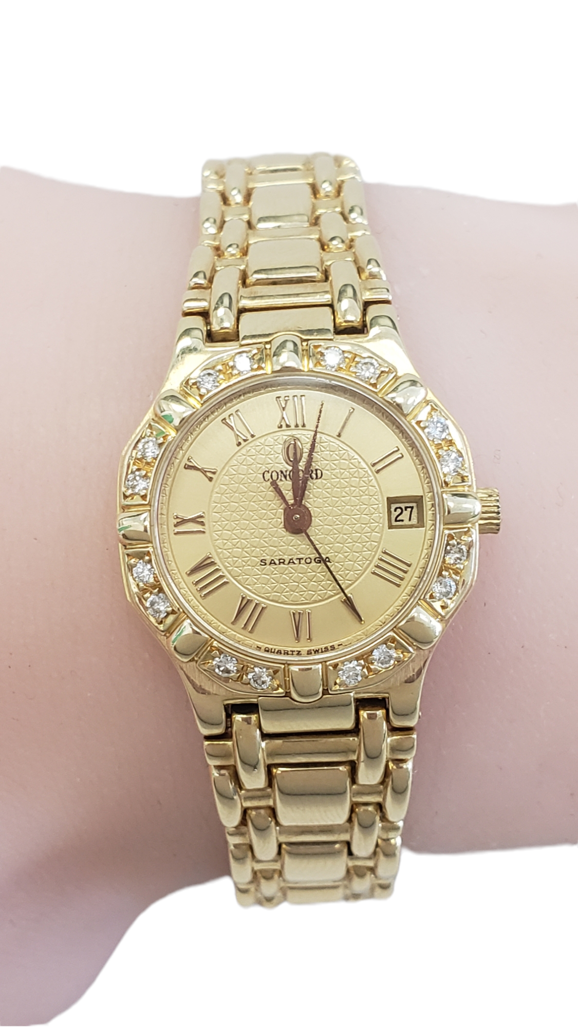 Concord Ladies 18 Karat Yellow Gold Diamond Bezel Saratoga Ladies Watch