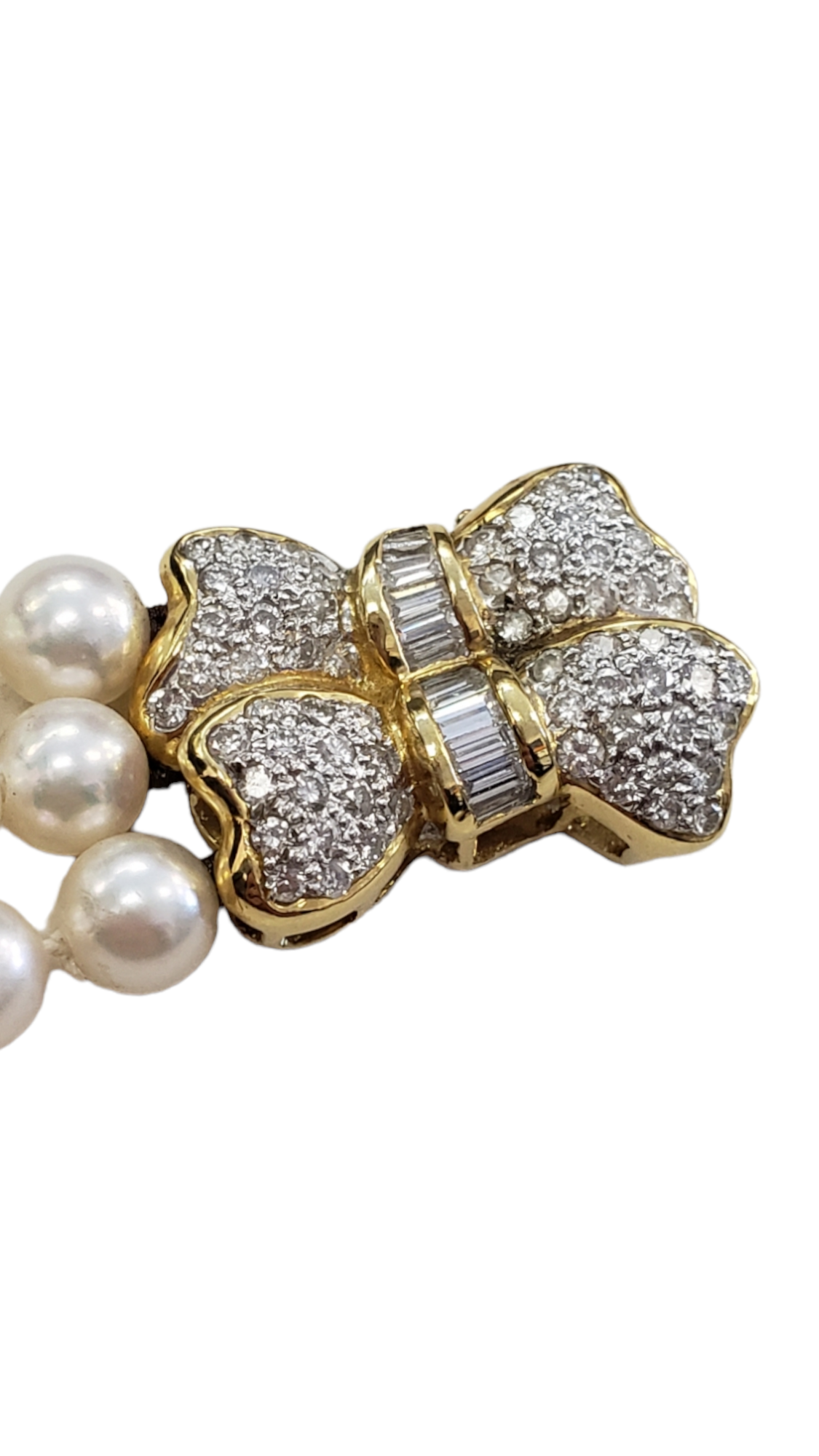 Cultured Triple Strand Pearl Bracelet w/ Diamond Bow Clasp made in 18-Karat Yellow Gold